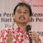 Mantan Wakil Menteri Desa Paiman Raharjo kepada Roy Suryo. (Dok. kemenpora.go.id)